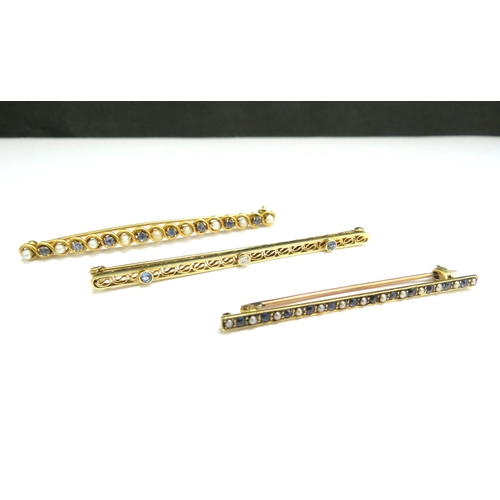 9099 - Three gold bar brooches, including two seed pearl and sapphire and one diamond and sapphire, two mar... 