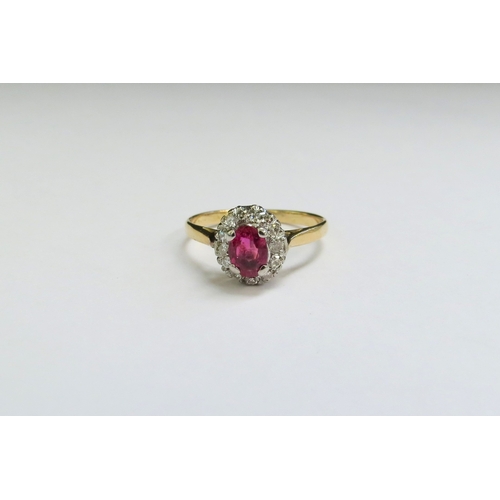 9024 - A ruby and diamond cluster ring, marks rubbed. Size L, 2.1g