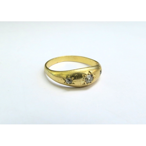 9083 - A gold gypsy ring set with three diamonds in star setting, unmarked. Size S, 3.2g  (C)