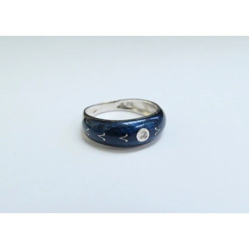 9068 - A Faberge blue enamel ring centrally set with a small diamond limited edition 7/300, stamped 750 whi... 