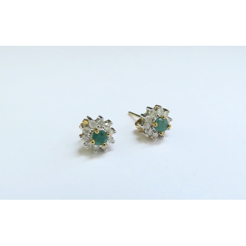 9067 - A pair of emerald and diamond cluster earrings, 1.5g