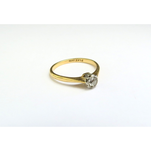 9089 - A diamond solitaire ring, stamped plat/18ct. Size N, 2.1g  (C)