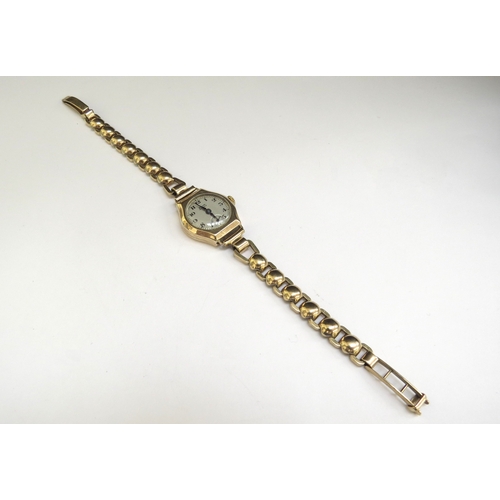 9080 - A 9ct gold wristwatch, 20g