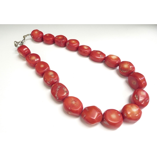 9097 - A coral necklace, each bead 2cm x 2cm approx, 46cm long  (R)  £100