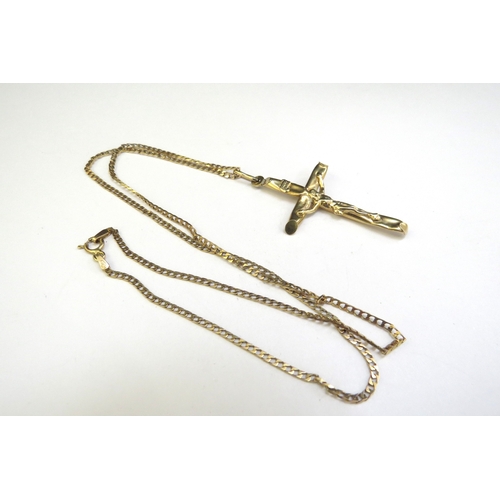 9239 - A 9ct gold crucifix (dented), hung on 9ct gold chain, 46cm long, 4.7g