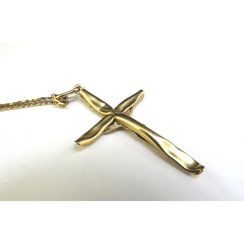 9239 - A 9ct gold crucifix (dented), hung on 9ct gold chain, 46cm long, 4.7g