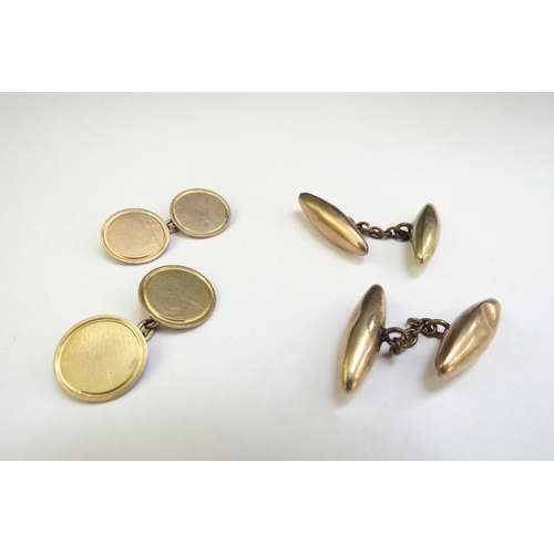 9124 - A pair of 9ct gold circular cufflinks and a pair of unmarked torpedo shape cufflinks, 8.4g