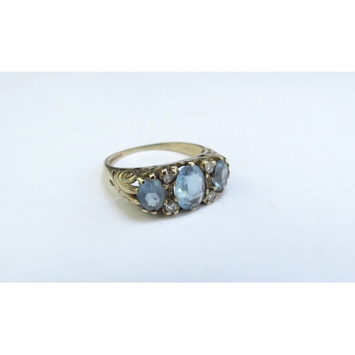 9161 - A 9ct gold aquamarine and diamond ring. Size L, 2.1g  (R)  £100