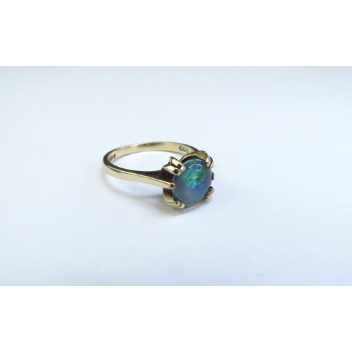 9192 - A 9ct gold opal doublet ring. Size L, 2.2g