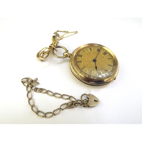 9129 - A gold fob watch marked 18k with a bow pin, 37.9g total and a 9ct gold bracelet, 2.3g  (R)  £250