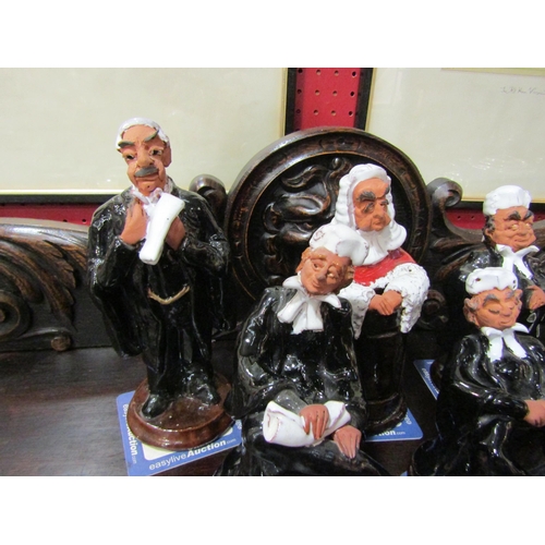 4030 - A group of five Chelsea Pottery legal figures, Seated Barrister, 15cm high (no.2651 incised on base)... 