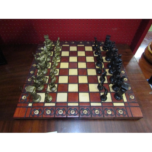 4058 - A modern chess set and board with Roman character pieces (One bishop a/f)   (R) £0