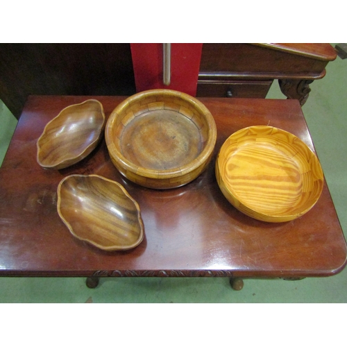 4062 - Four treen bowls and dishes   (R) £10