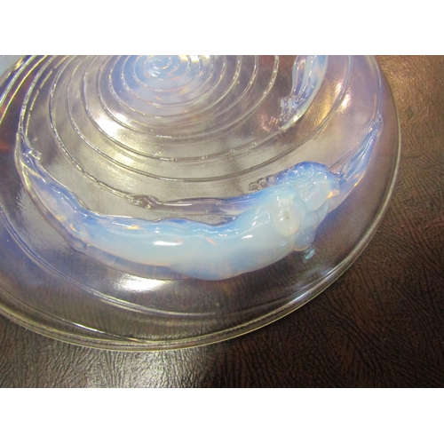 4069 - A Sabino Paris opaline glass charger decorated with three nude female swimmers, 30cm diameter