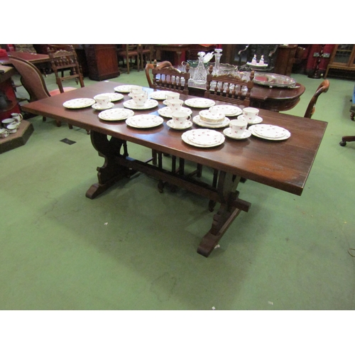 4100 - An oak refectory table on sledge feet with stretcher, 72cm tall x 181cm long x 82cm wide