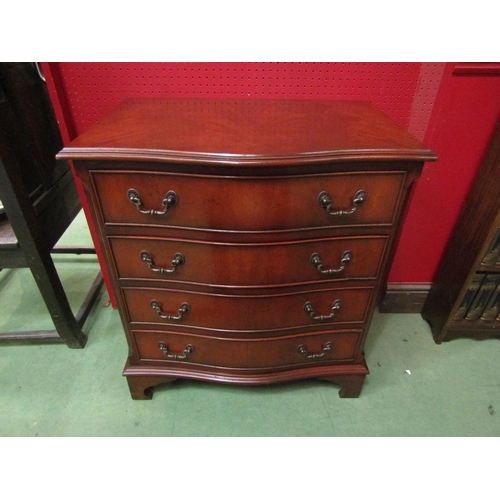 4109 - In the manner of Bevan funnell a George III style flame mahogany serpentine front chest of four draw... 