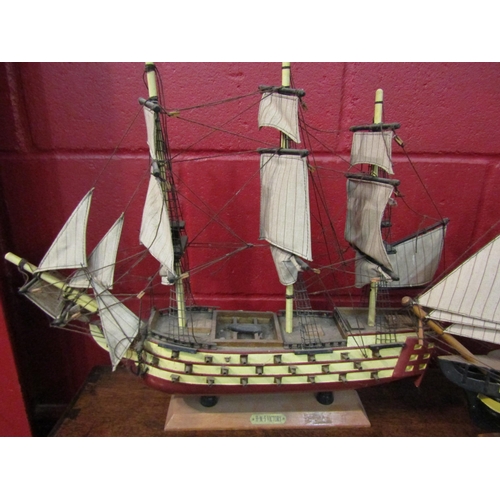 4164 - Two model men of war ships, H.M.S. Victory and H.M.S. Agamemnon, largest 46cm x 52cm