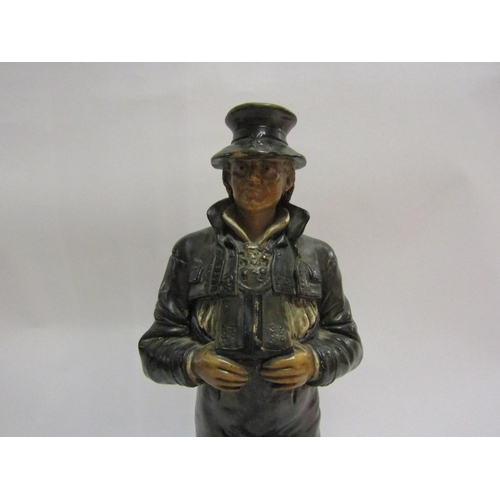 4251 - A DEP German ceramic figure of a man leaning against a tree stump a/f, chips to base, 32cm height