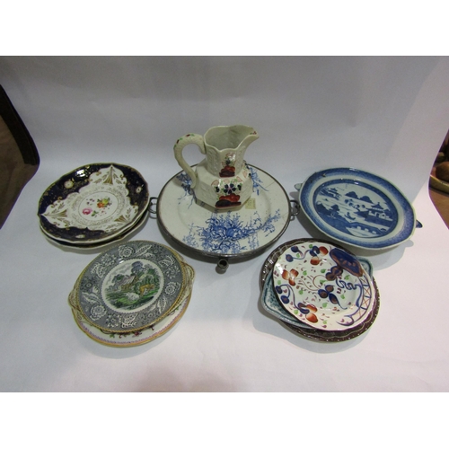 4253 - Mixed 19th Century and later plates and warming plates including Imari and blue and white and Orient... 