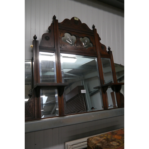 2328 - A carved overmantel mirror