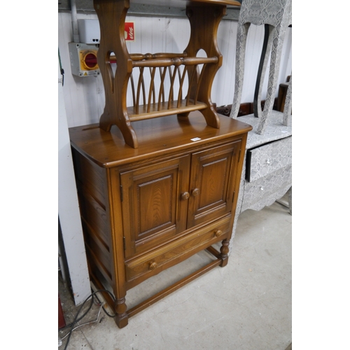 2339 - An Ercol Golden Dawn cupboard