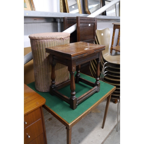 2351 - A 1950's felt top card table, loom linen bin and an oak stool