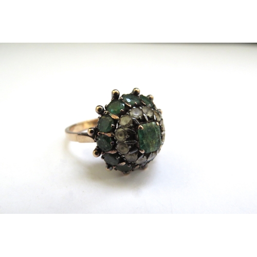 9222 - An emerald and clear stone multi stone domed ring, unmarked. Size L, 5.5g  (R)   £80