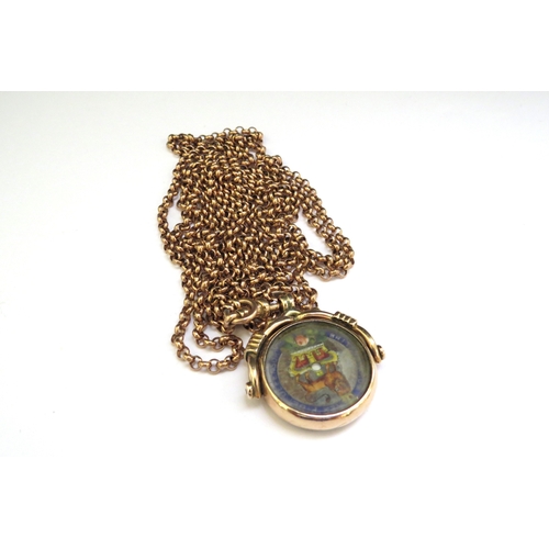 9361 - A gold framed enamelled coin swivel fob stamped 10c, hung on metal chain