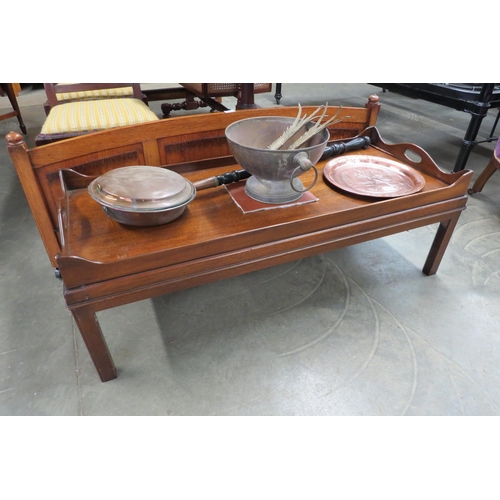 2180 - A mahogany galleried coffee table, labelled reprodux with Queen's award to base, approximately 50cm ... 