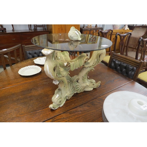 2186 - A 1920's French carved wood and plaster triple Dolphin based coffee table, with later glass circular... 