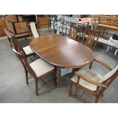 2239 - A Golden Dawn Ercol dining table and six chairs