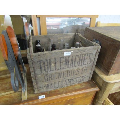 2252 - A Tollemaches crate of vintage beer bottles