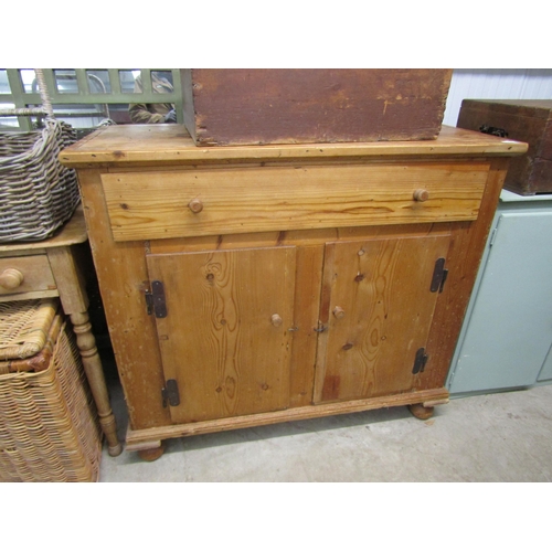 2261 - A country pine one drawer over two door sideboard