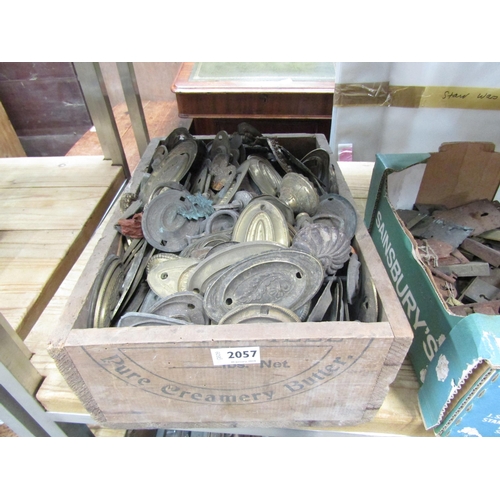 2057 - A box of 19th Century brass handle plates