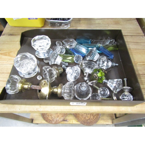 2058 - A tray of glass knobs