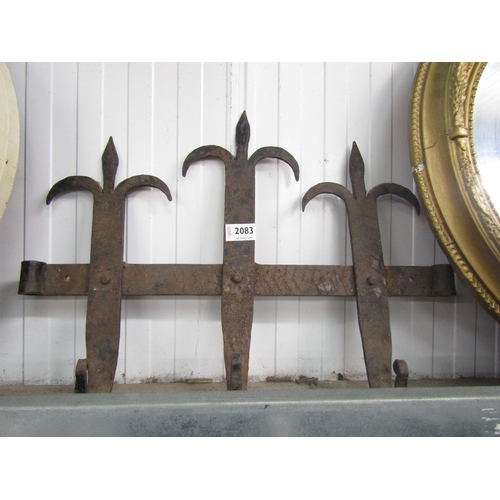 2083 - A wrought iron fleur-de-lys wall fixing hook rack