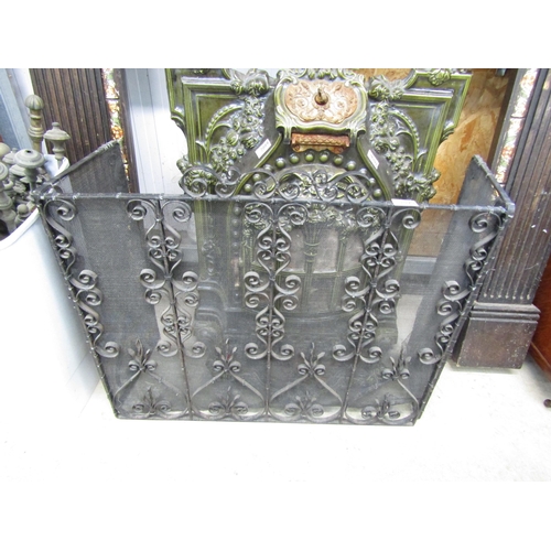 2090 - A wrought iron fire guard