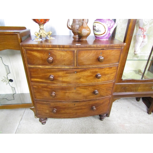 2104 - A Victorian mahogany bow fronted two over three chest of drawers