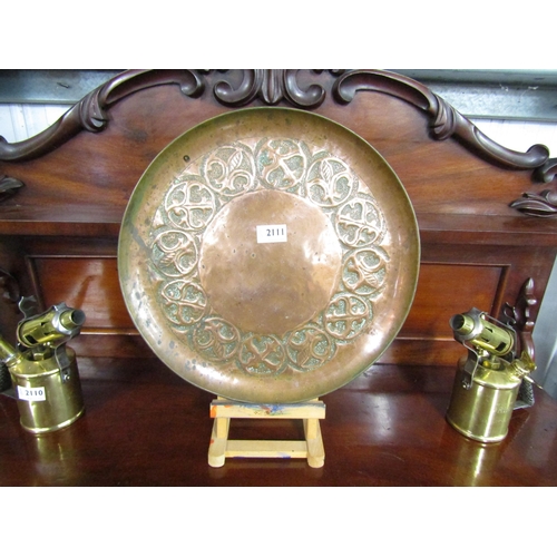 2111 - An Arts and Crafts copper charger 39cm diameter