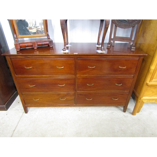 2114 - A mahogany chest of six drawers