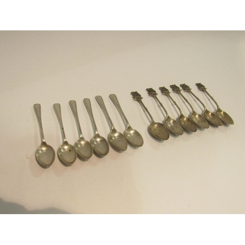 4310 - Two sets of six silver teaspoons, one set with ships to finial (12)