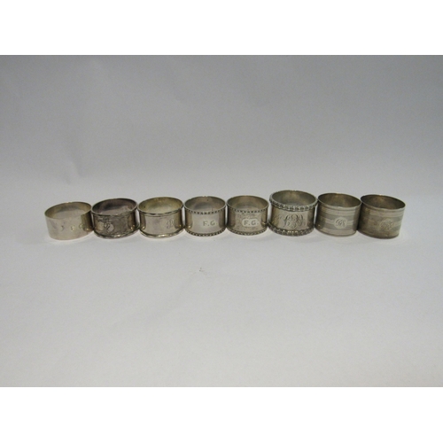 4311 - Three pairs of silver napkin rings and two singular examples (8)