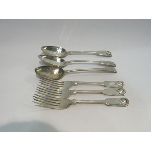 4318 - Three silver serving spoons and three silver dinner forks, five of which with shell relief terminals... 