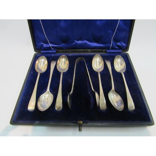 4327 - A cased set of six silver teaspoons, finely decorated on the underside of spoon together with anothe... 