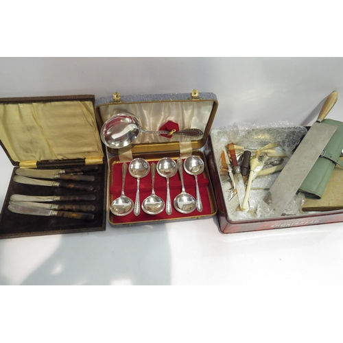 4421 - A collection of boxed cutlery to include silver handled examples, together with some loose examples,... 