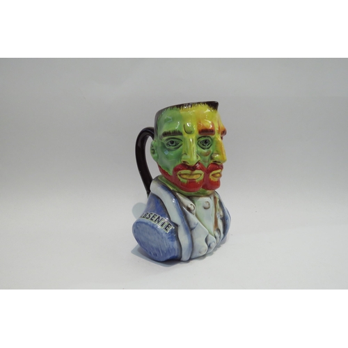 4428 - An Absente three face jug, 19cm high