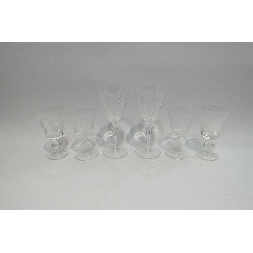 4440 - A cut glass baluster form decanter, a moulded and plated ewer and various wine glasses including cry... 