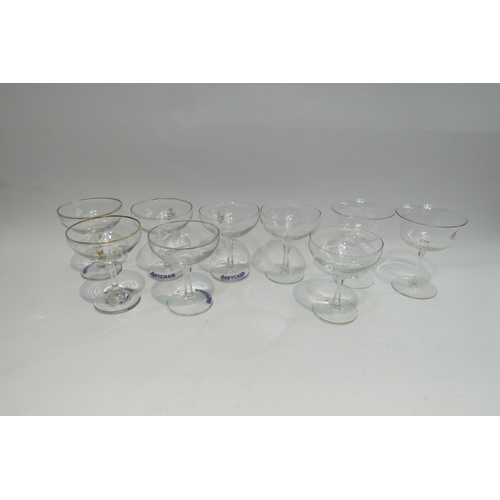 4445 - Five Babycham glasses and a further four champagne saucers (9)