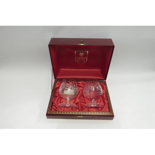 4470 - A pair of Edinburgh crystal brandy balloons in presentation case, chip to foot of one