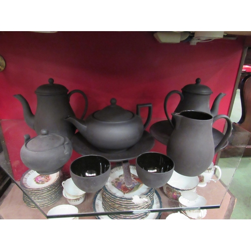 4004 - Nine pieces of Wedgwood black basalt coffee and tea wares